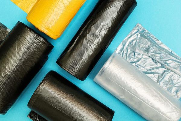 Photo of different coloured waste bags for collection